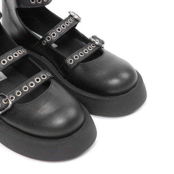 bebe con fibbie in pelle nera