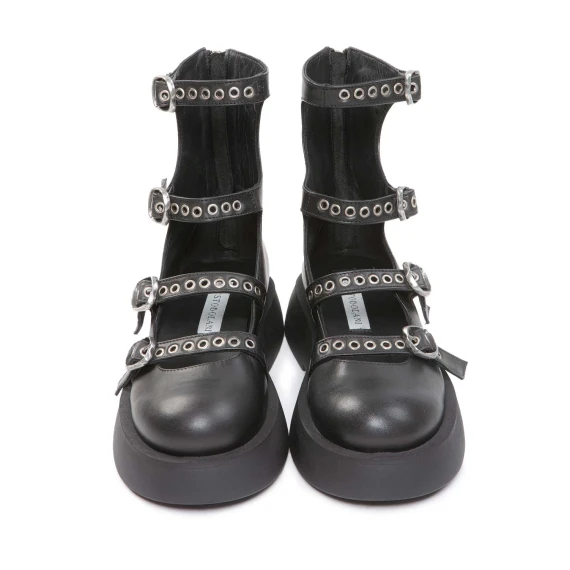 bebe con fibbie in pelle nera