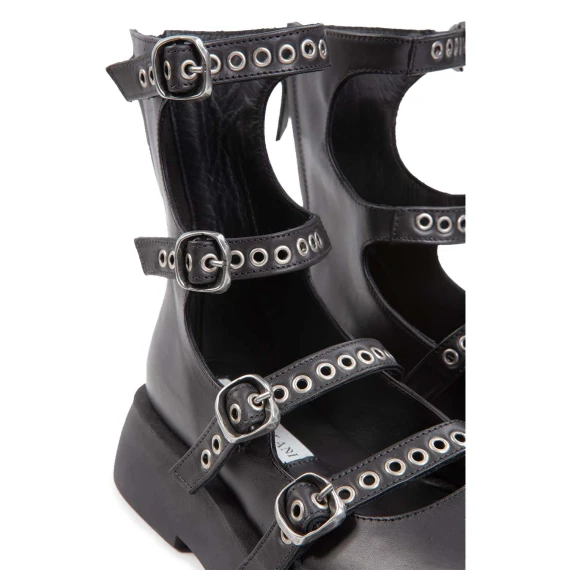 bebe con fibbie in pelle nera